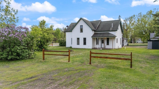 8965 Market St, Sturgeon Lake, MN 55783 - rear view of house featuring a shingled roof