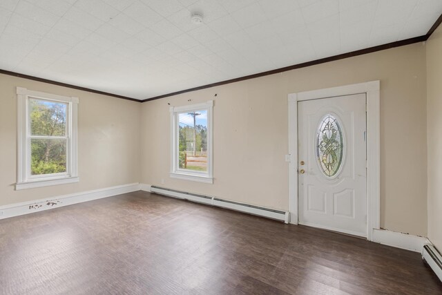 8965 Market St, Sturgeon Lake, MN 55783 - entrance foyer with baseboard heating, healthy amount of natural light, crown molding, and dark wood finished floors