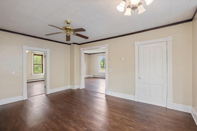 8965 Market St, Sturgeon Lake, MN 55783 - spare room with a ceiling fan, dark wood-style flooring, a baseboard heating unit, plenty of natural light, and crown molding