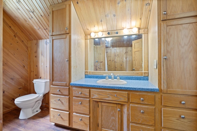 8965 Market St, Sturgeon Lake, MN 55783 - full bath with toilet, vanity, wooden walls, wood finished floors, and wood ceiling