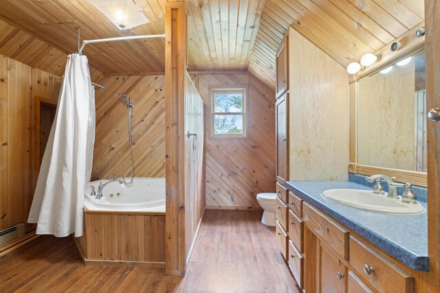 8965 Market St, Sturgeon Lake, MN 55783 - bathroom featuring wooden ceiling, hardwood / wood-style flooring, vanity, wooden walls, and toilet