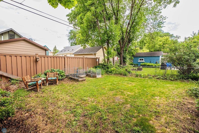 1328 6th St S, Fargo, ND 58103 - view of yard with a vegetable garden