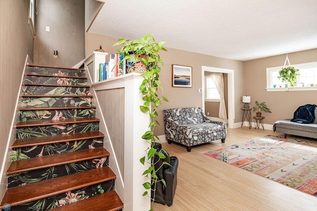 1328 6th St S, Fargo, ND 58103 - stairs featuring wood finished floors and baseboards