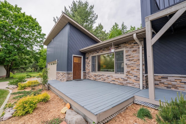 E13680 Stelter Rd, Fall Creek, WI 54742 - wooden deck with an attached garage
