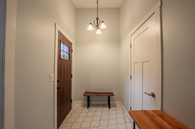 E13680 Stelter Rd, Fall Creek, WI 54742 - entryway with a chandelier and baseboards