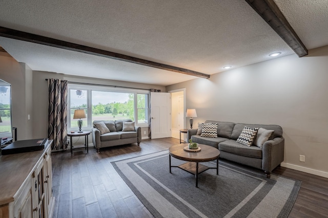E13680 Stelter Rd, Fall Creek, WI 54742 - living room with a textured ceiling, beam ceiling, dark wood-style flooring, and baseboards