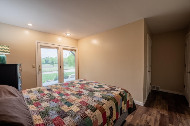 E13680 Stelter Rd, Fall Creek, WI 54742 - bedroom featuring access to exterior, dark wood-style flooring, baseboards, and recessed lighting