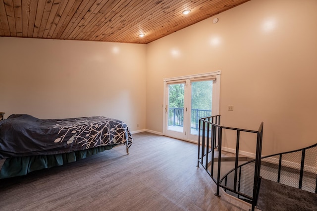 E13680 Stelter Rd, Fall Creek, WI 54742 - bedroom featuring access to exterior, wood finished floors, wooden ceiling, baseboards, and recessed lighting