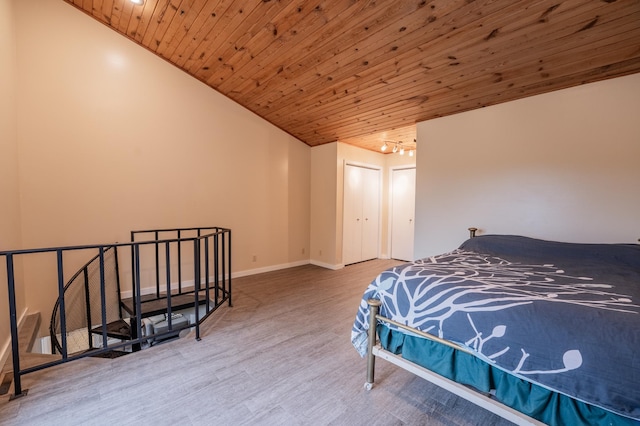 E13680 Stelter Rd, Fall Creek, WI 54742 - bedroom with lofted ceiling, wood ceiling, wood finished floors, and baseboards