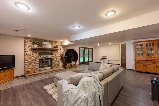 E13680 Stelter Rd, Fall Creek, WI 54742 - living area with a stone fireplace, wood finished floors, baseboards, and recessed lighting