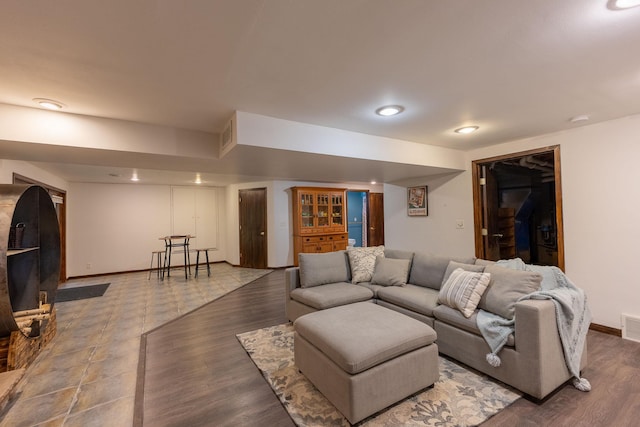 E13680 Stelter Rd, Fall Creek, WI 54742 - living room featuring baseboards, recessed lighting, and wood finished floors