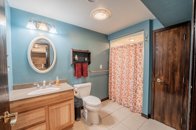 E13680 Stelter Rd, Fall Creek, WI 54742 - full bath with vanity, toilet, tile patterned flooring, a shower with shower curtain, and baseboards
