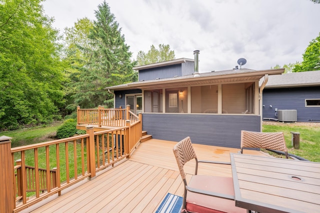 E13680 Stelter Rd, Fall Creek, WI 54742 - deck with central air condition unit and a sunroom