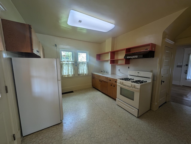 1713 Penn Ave N, Minneapolis, MN 55411 - kitchen with white appliances, under cabinet range hood, light floors, open shelves, and baseboards