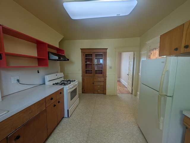 1713 Penn Ave N, Minneapolis, MN 55411 - kitchen featuring white appliances, under cabinet range hood, open shelves, light countertops, and light floors