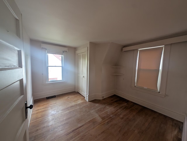 1713 Penn Ave N, Minneapolis, MN 55411 - unfurnished bedroom with wood finished floors and baseboards