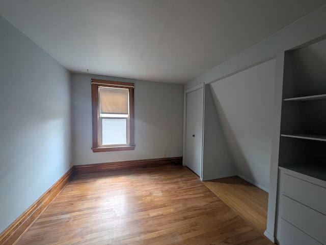 1713 Penn Ave N, Minneapolis, MN 55411 - empty room featuring light wood-style floors and baseboards