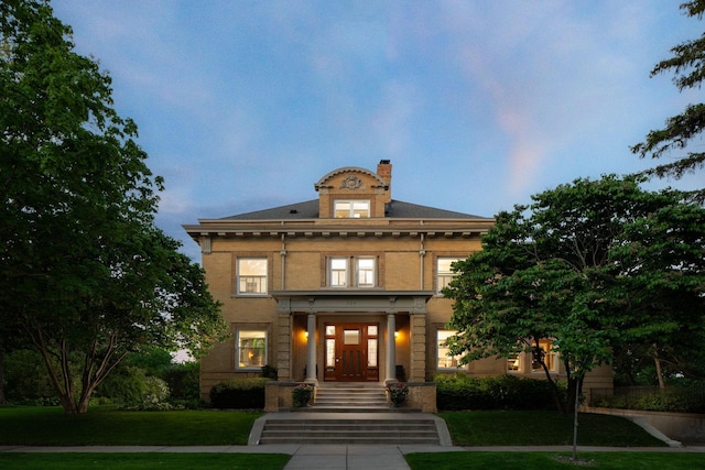 226 Grotto St S, Saint Paul, MN 55105 - view of front of home with a front lawn and a chimney