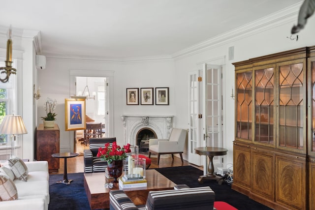 226 Grotto St S, Saint Paul, MN 55105 - living area with ornamental molding, wood finished floors, and a fireplace