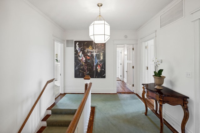 226 Grotto St S, Saint Paul, MN 55105 - carpeted entrance foyer with ornamental molding and baseboards