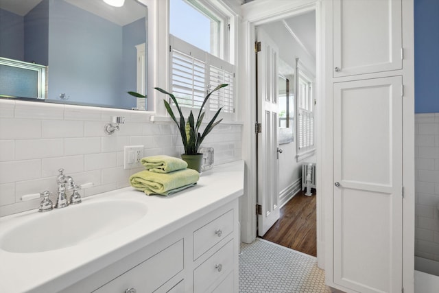 226 Grotto St S, Saint Paul, MN 55105 - bathroom with vanity, tile patterned flooring, and a shower with door