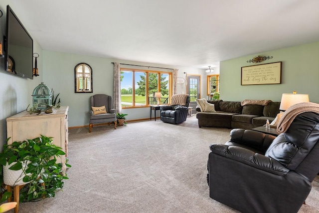 21750 County 36, Reynolds Twp, MN 56347 - carpeted living area featuring baseboards