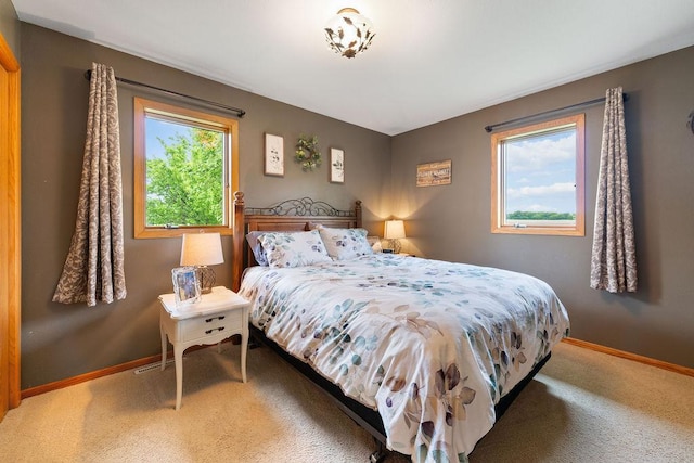 21750 County 36, Reynolds Twp, MN 56347 - bedroom with baseboards and carpet floors