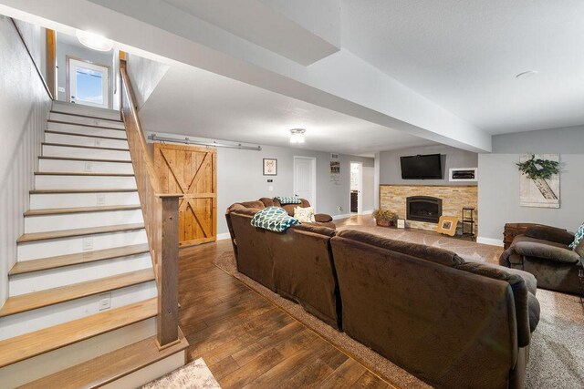 21750 County 36, Reynolds Twp, MN 56347 - living area with hardwood / wood-style flooring, stairway, a fireplace, and baseboards