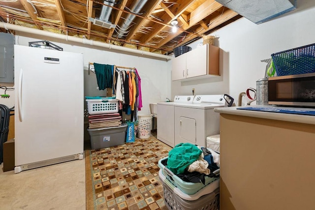 21750 County 36, Reynolds Twp, MN 56347 - washroom featuring washing machine and dryer and cabinet space