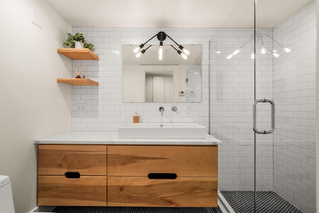 4705 Lyndale Ave S, Minneapolis, MN 55419 - full bath featuring vanity, a stall shower, and decorative backsplash