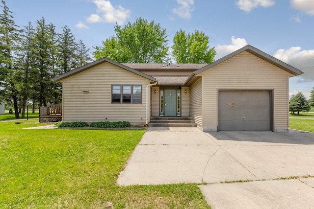 425 Franklin St, Morristown, MN 55052 - view of front of house featuring a garage, driveway, and a front yard
