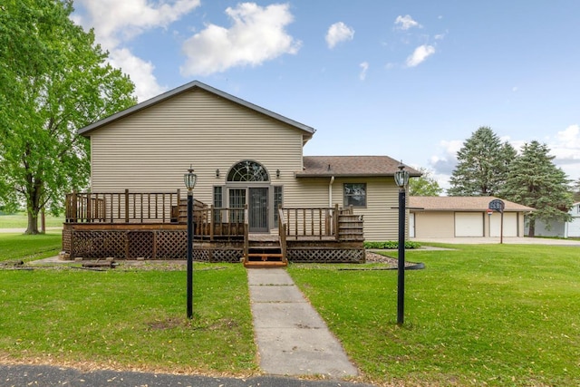 425 Franklin St, Morristown, MN 55052 - view of front of property with a wooden deck, a front yard, and a garage