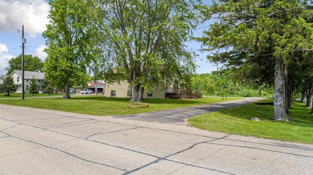425 Franklin St, Morristown, MN 55052 - obstructed view of property with a front lawn and driveway