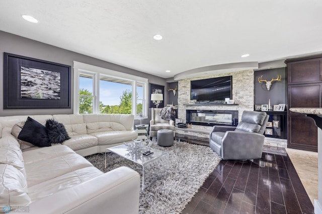 18117 Cherry Creek Ln, Erie Twp, MN 56501 - living area with dark wood finished floors, recessed lighting, and a fireplace
