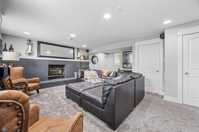 18117 Cherry Creek Ln, Erie Twp, MN 56501 - carpeted living area with a brick fireplace, a textured ceiling, and recessed lighting