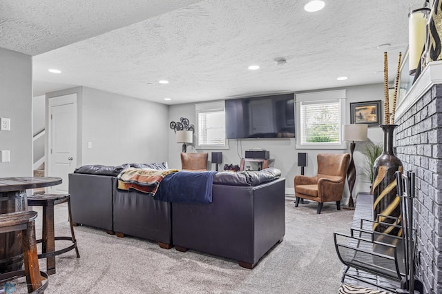 18117 Cherry Creek Ln, Erie Twp, MN 56501 - living room with stairs, a textured ceiling, light carpet, recessed lighting, and healthy amount of natural light