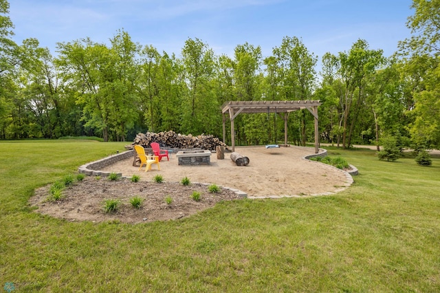 18117 Cherry Creek Ln, Erie Twp, MN 56501 - view of playground featuring a fire pit, a pergola, a lawn, and a patio