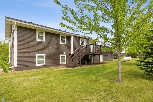 18117 Cherry Creek Ln, Erie Twp, MN 56501 - rear view of house with stairs, a wooden deck, and a yard