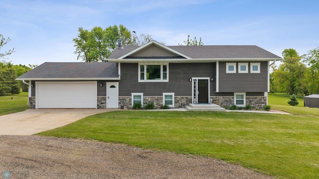 18117 Cherry Creek Ln, Erie Twp, MN 56501 - bi-level home featuring a garage, stone siding, and concrete driveway