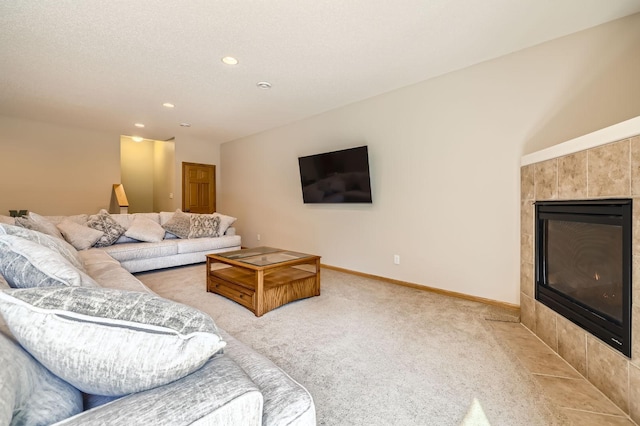 1110 Lia Ct, Northfield, MN 55057 - living area with a tile fireplace, carpet floors, and recessed lighting