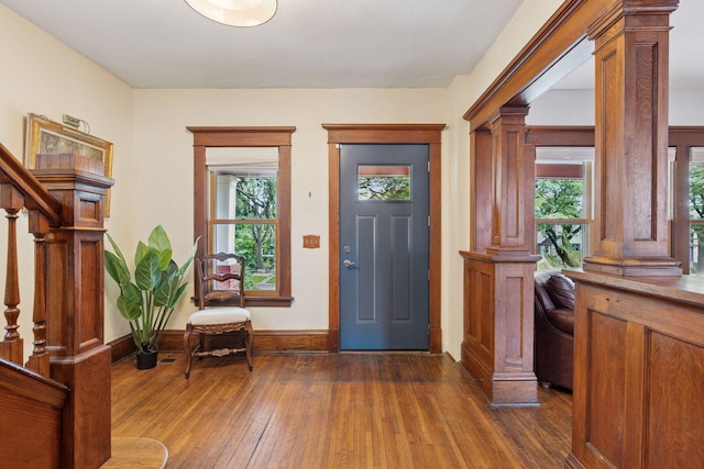 896 Carroll Ave, Saint Paul, MN 55104 - foyer featuring healthy amount of natural light, dark wood-style floors, and stairs