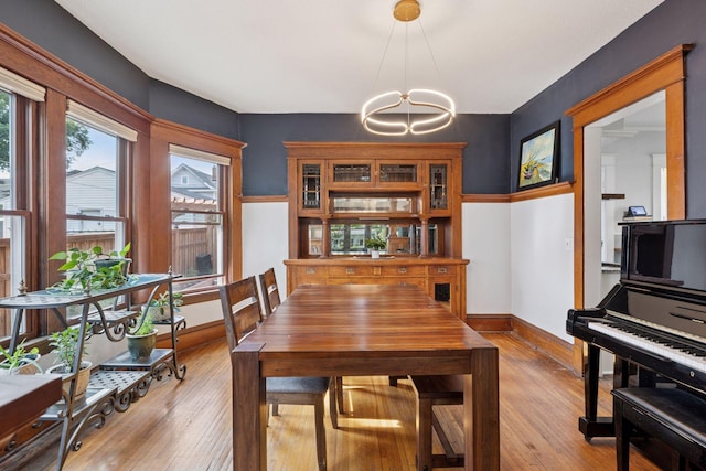 896 Carroll Ave, Saint Paul, MN 55104 - dining room featuring a chandelier and light wood-type flooring