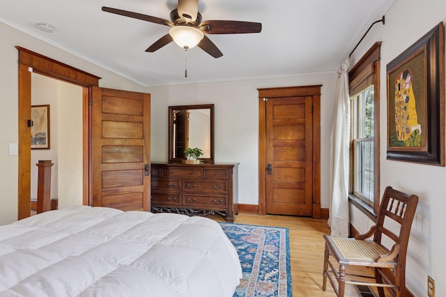 896 Carroll Ave, Saint Paul, MN 55104 - bedroom with light wood-type flooring, crown molding, and ceiling fan