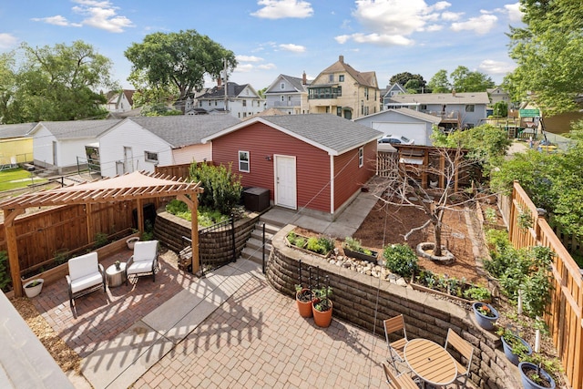 896 Carroll Ave, Saint Paul, MN 55104 - fenced backyard with a residential view, a patio, and an outbuilding