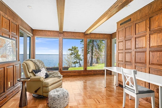 2900 London Rd, Duluth, MN 55804 - sunroom / solarium with a water view, beam ceiling, wooden walls, and plenty of natural light