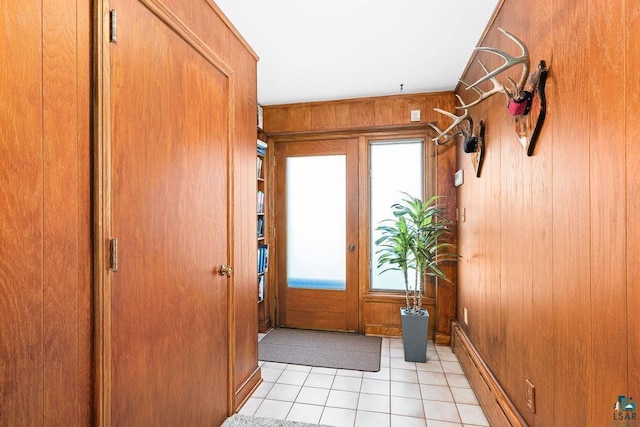 2900 London Rd, Duluth, MN 55804 - doorway with wood walls and light tile patterned floors