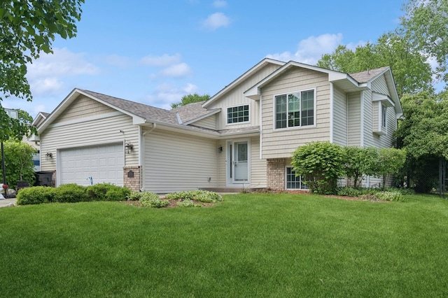 2035 123rd Ave NW, Coon Rapids, MN 55448 - split level home with a front lawn, an attached garage, brick siding, and a shingled roof