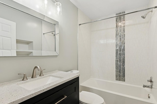2035 123rd Ave NW, Coon Rapids, MN 55448 - bathroom featuring toilet, shower / washtub combination, and vanity