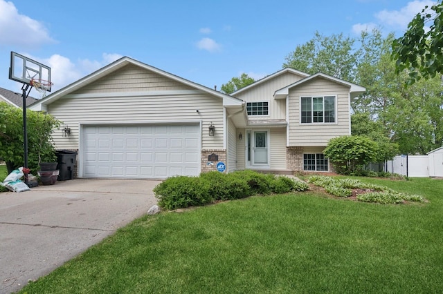 2035 123rd Ave NW, Coon Rapids, MN 55448 - split level home with driveway, an attached garage, and brick siding