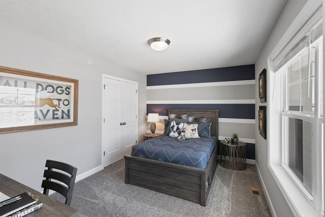 21749 Lilac Dr, Farmington, MN 55024 - carpeted bedroom featuring baseboards and a closet